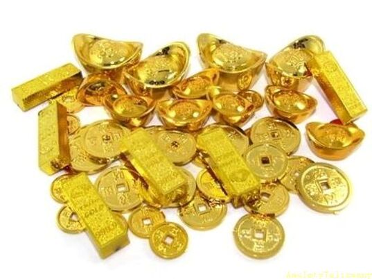 gold bars and coins as lucky charms