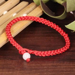 Bracelet of red thread